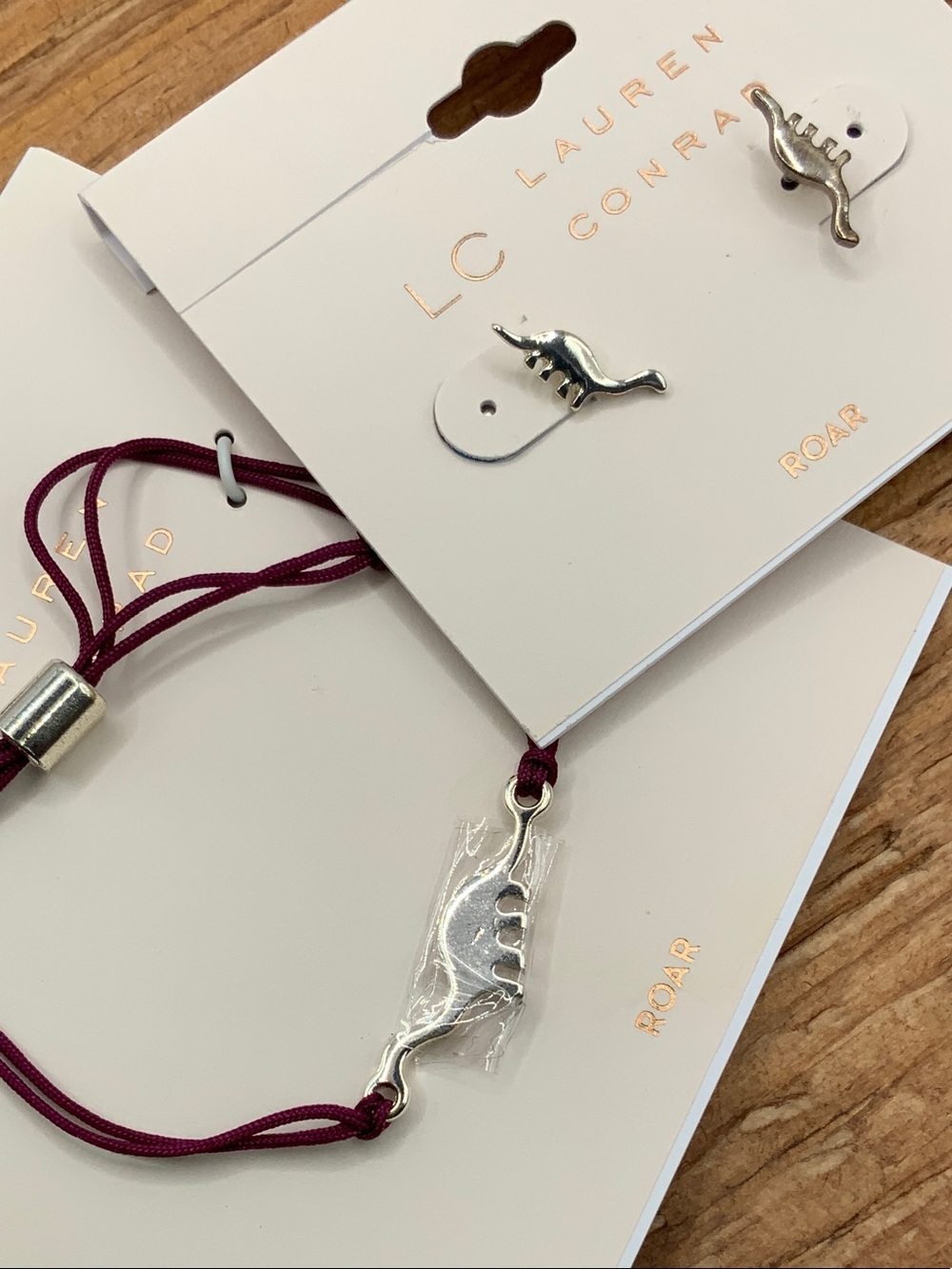 LC Lauren Conrad Roar Silver Tone Dinosaur Burgundy Cord Bracelet Earrings Set